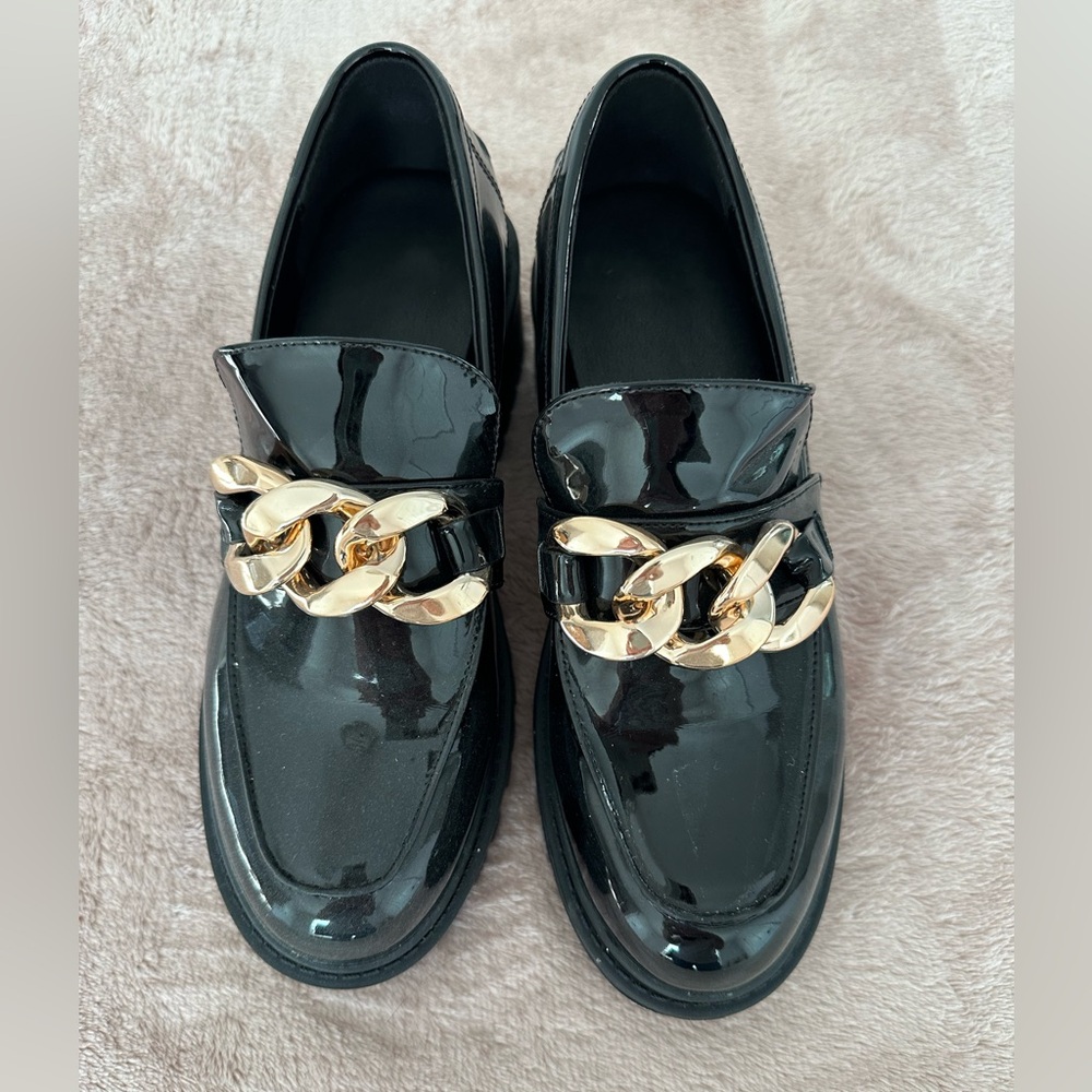 Patent Leather Chunky Loafers with Gold Chain Detail.